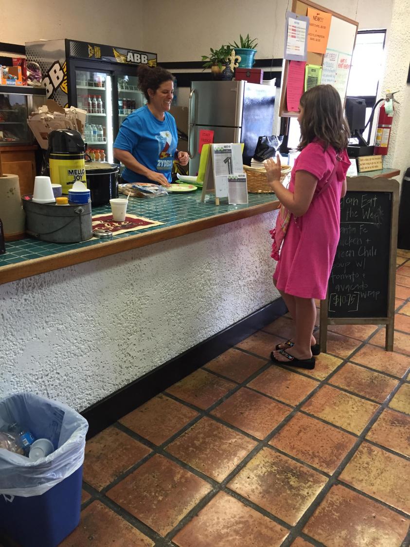 Mary Kay serving a customer