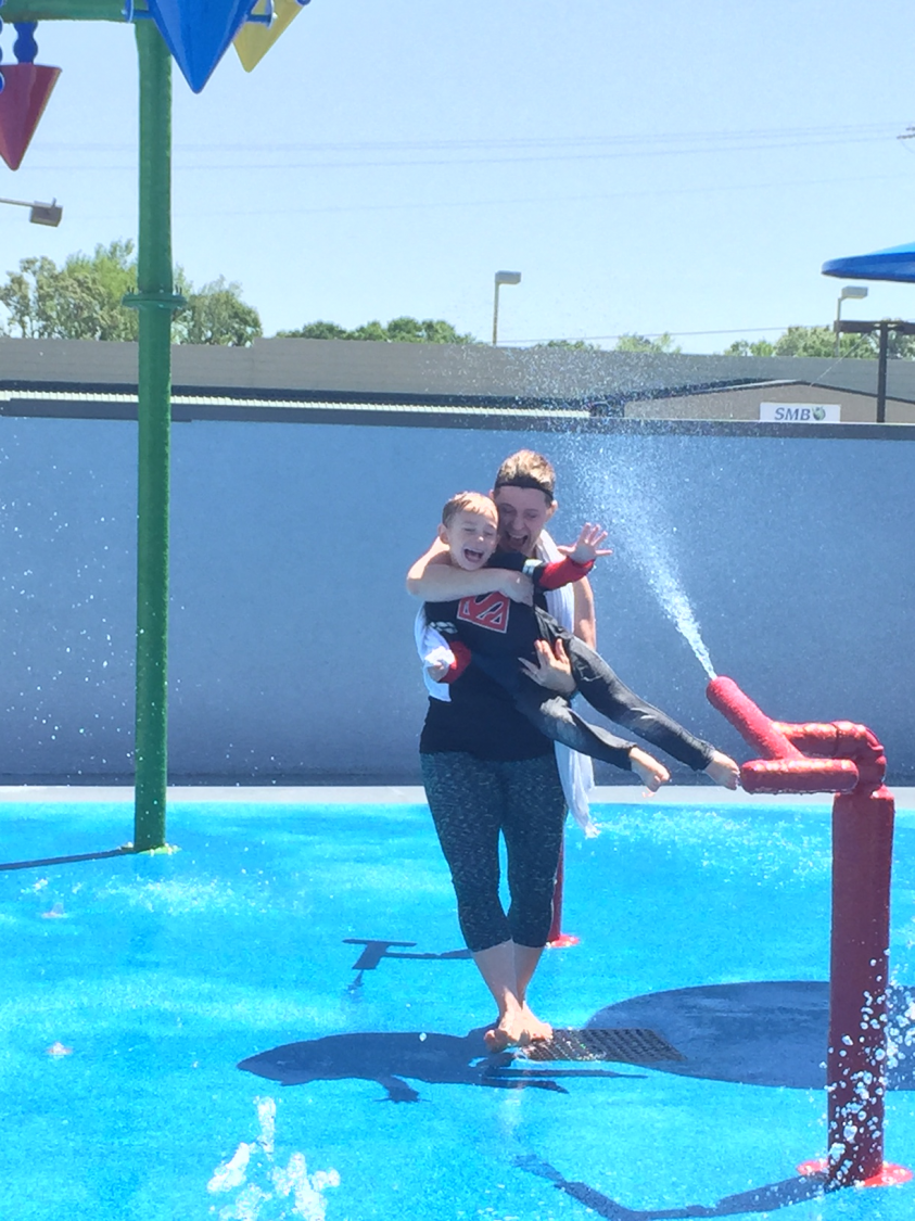 Mrs. Angie & Henry enjoying the New Splash Pad